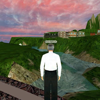 Here in River City, one's avatar can view the river for which the city was named. In the distance are the center of town and a collection of homes.
